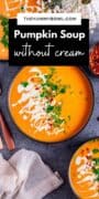 vegan pumpkin soup with cilantro and sour cream in a bowl