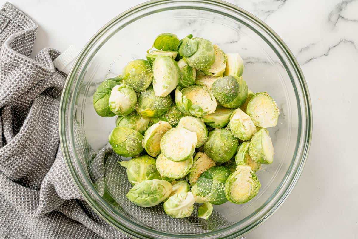 fresh brussel sprouts in mixing bowl