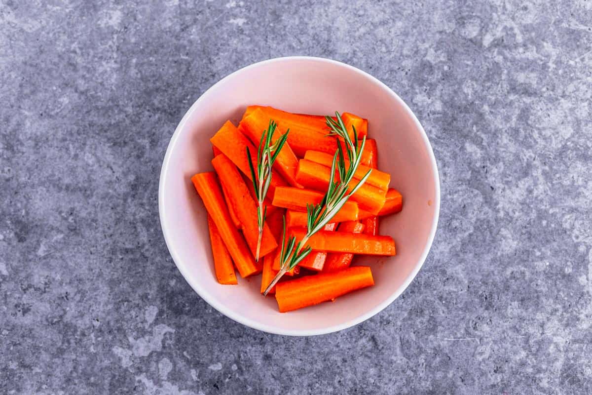 carrots marinating in honey and seasonings