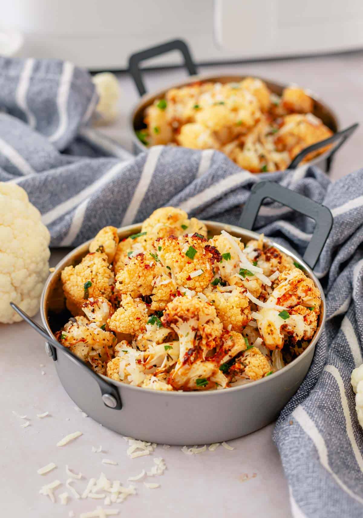 air fryer cauliflower in small metal serving dish