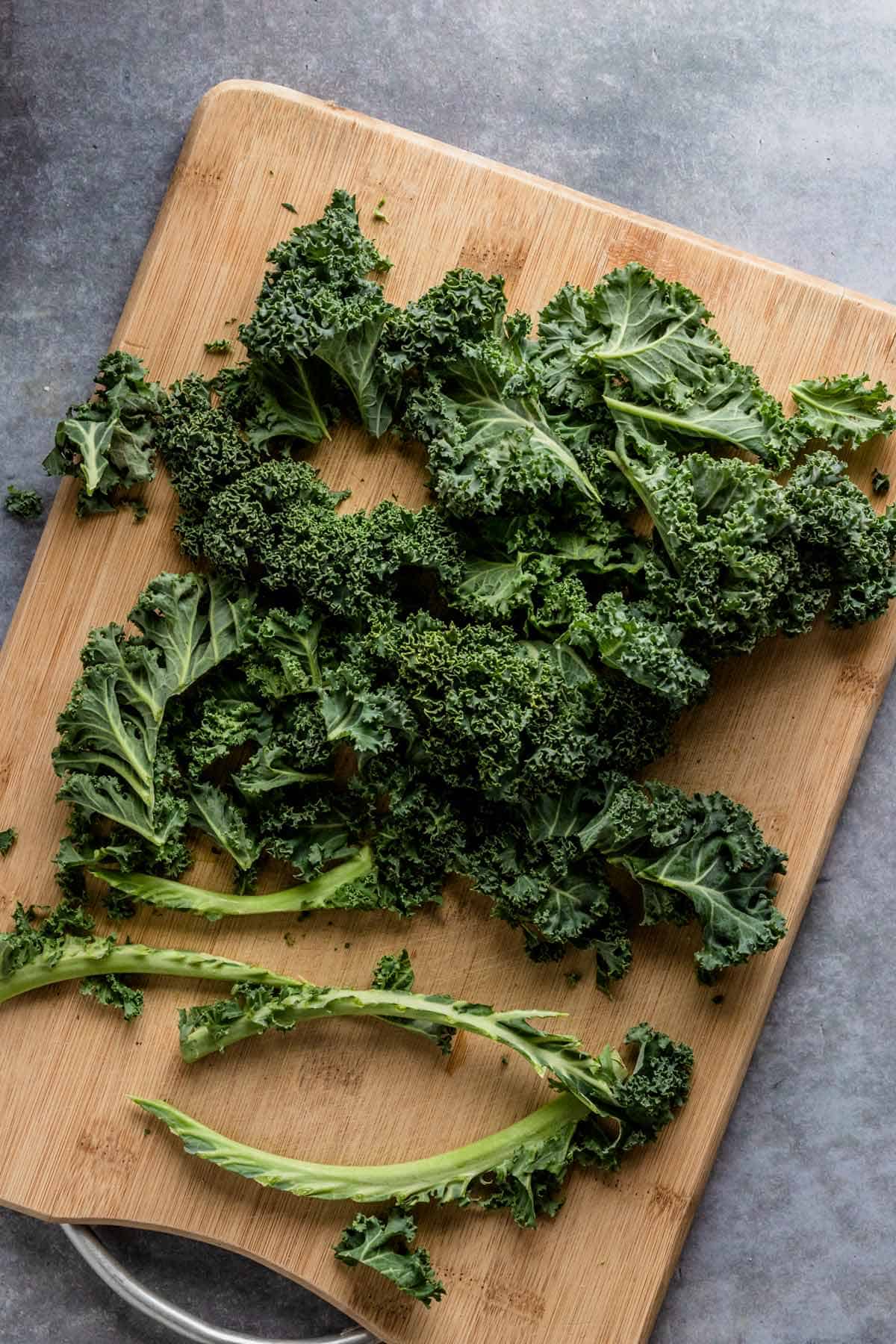 kale leaves on wooden board