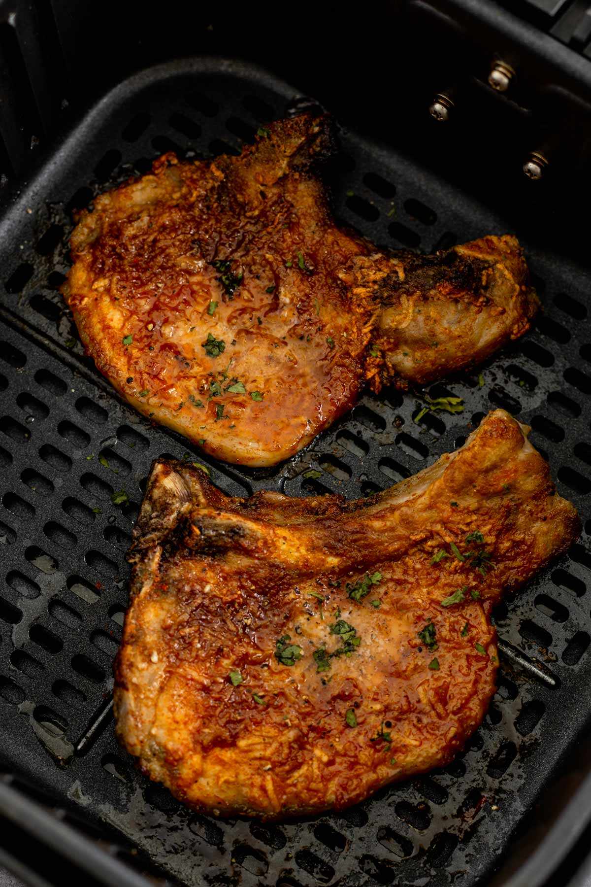 cooked bone in pork chops in air fryer basket