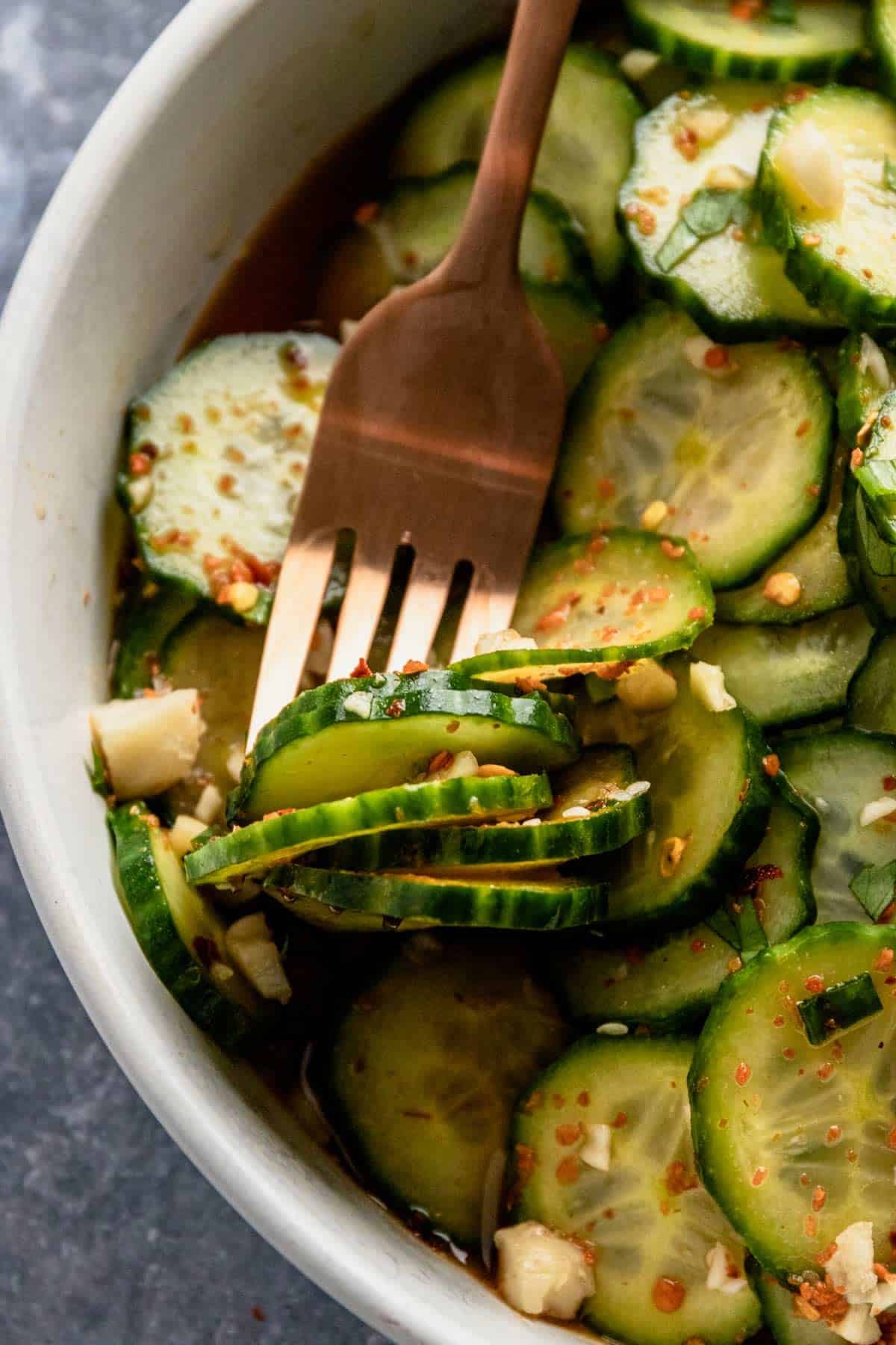 spicy cucumber salad with peanuts in a bowl