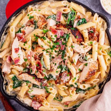 This Creamy Chicken Bacon And Spinach Pasta is one of our all-time favorite dinner recipes. Tender juicy chicken over pasta in a rich creamy sauce with spinach and bacon. An excellent easy weeknight or weekend dinner recipe for the whole family. Yum! - The Yummy Bowl