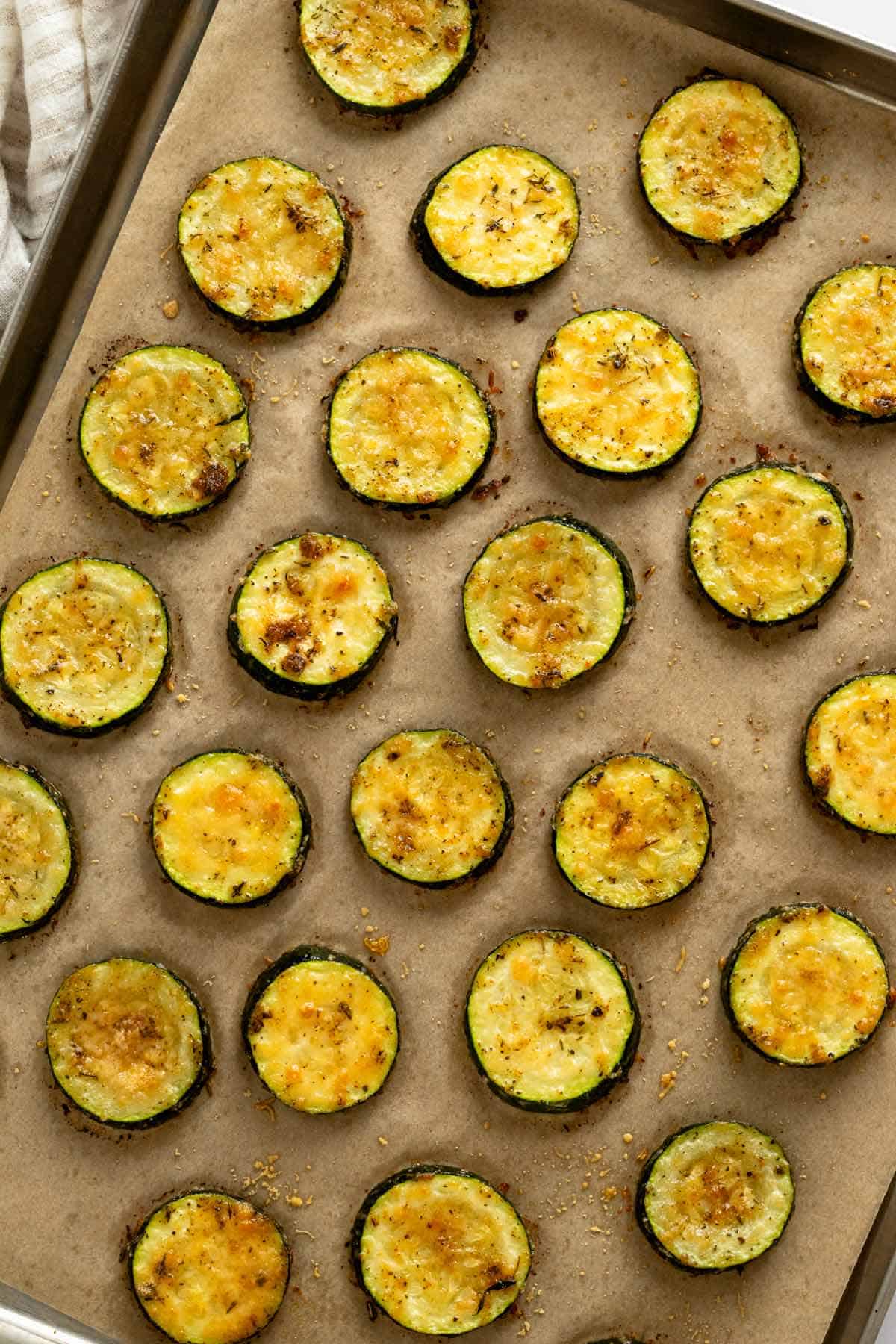 zucchini slices on baking sheet right after baking.