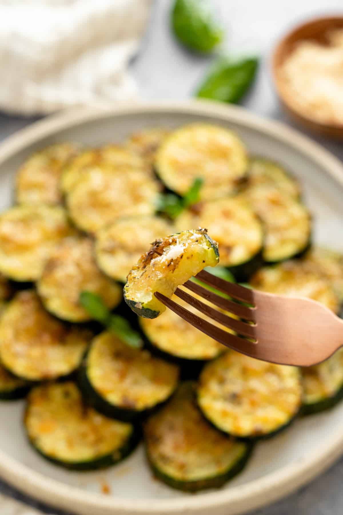 bite shot of zucchini slice on a fork.