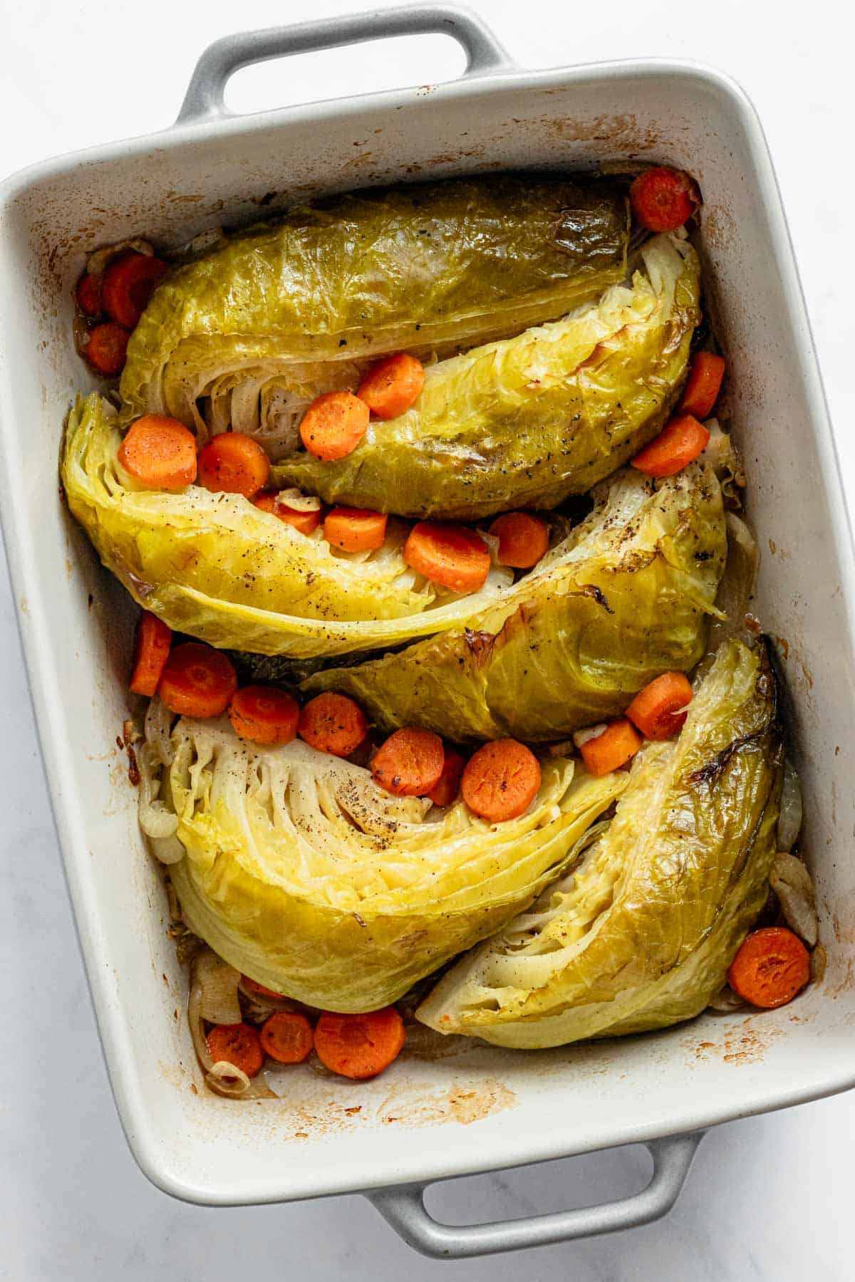 cooked cabbage in casserole dish.