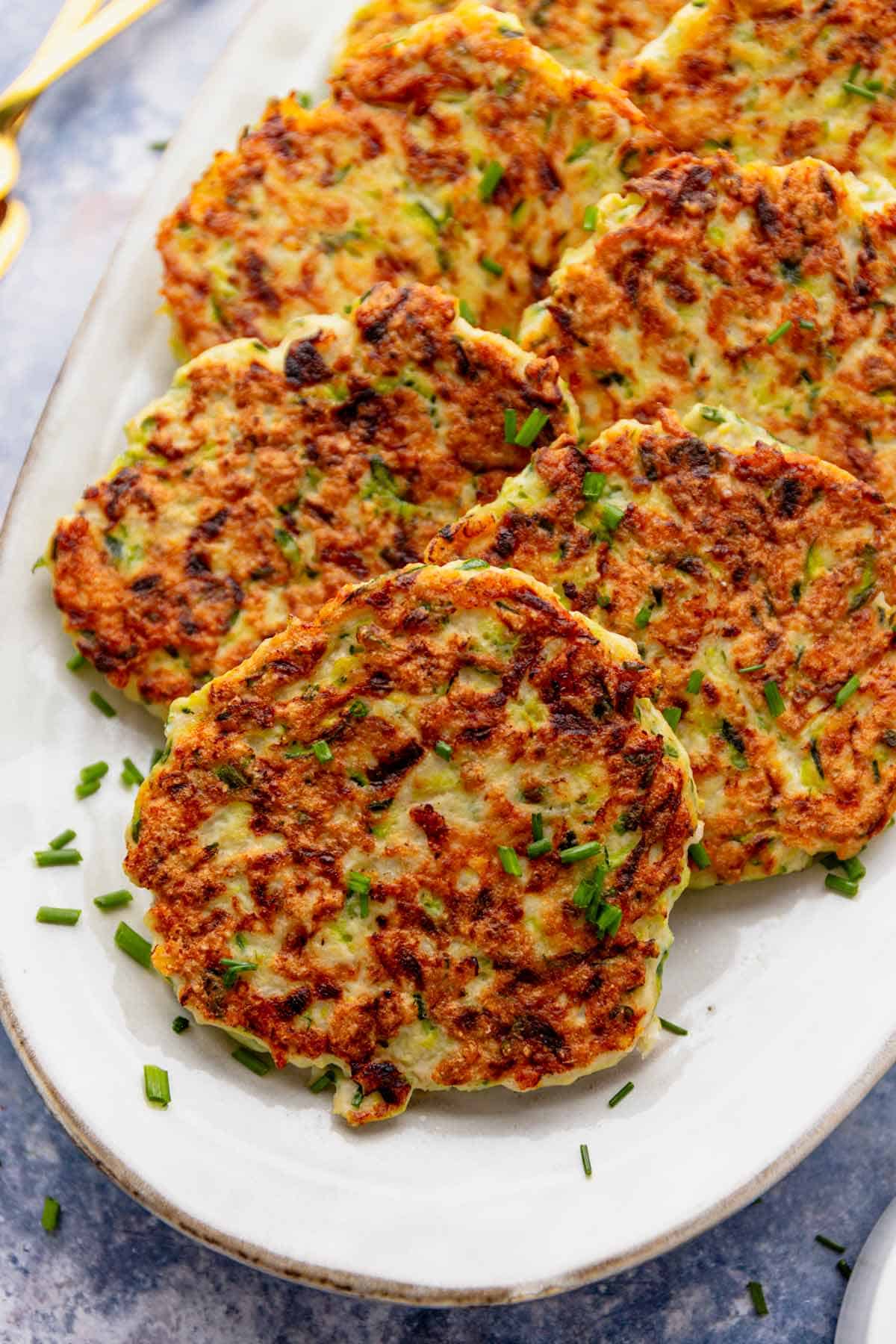 cooked chicken fritters in serving platter.