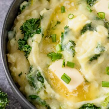 mashed potatoes with kale in a bowl