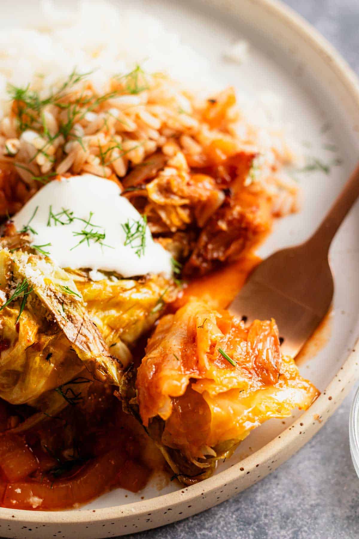 caramelized cabbage wedges on serving plate.