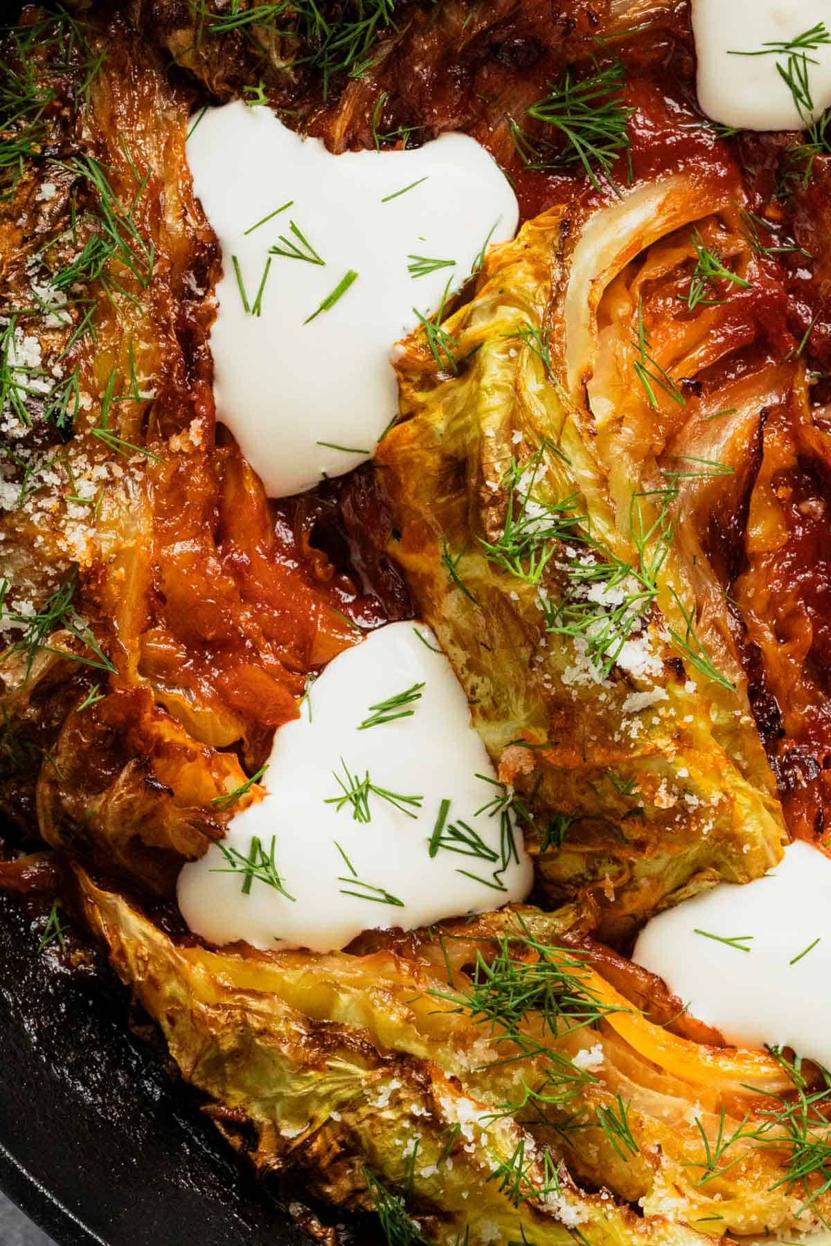 caramelized cabbage wedges in skillet.