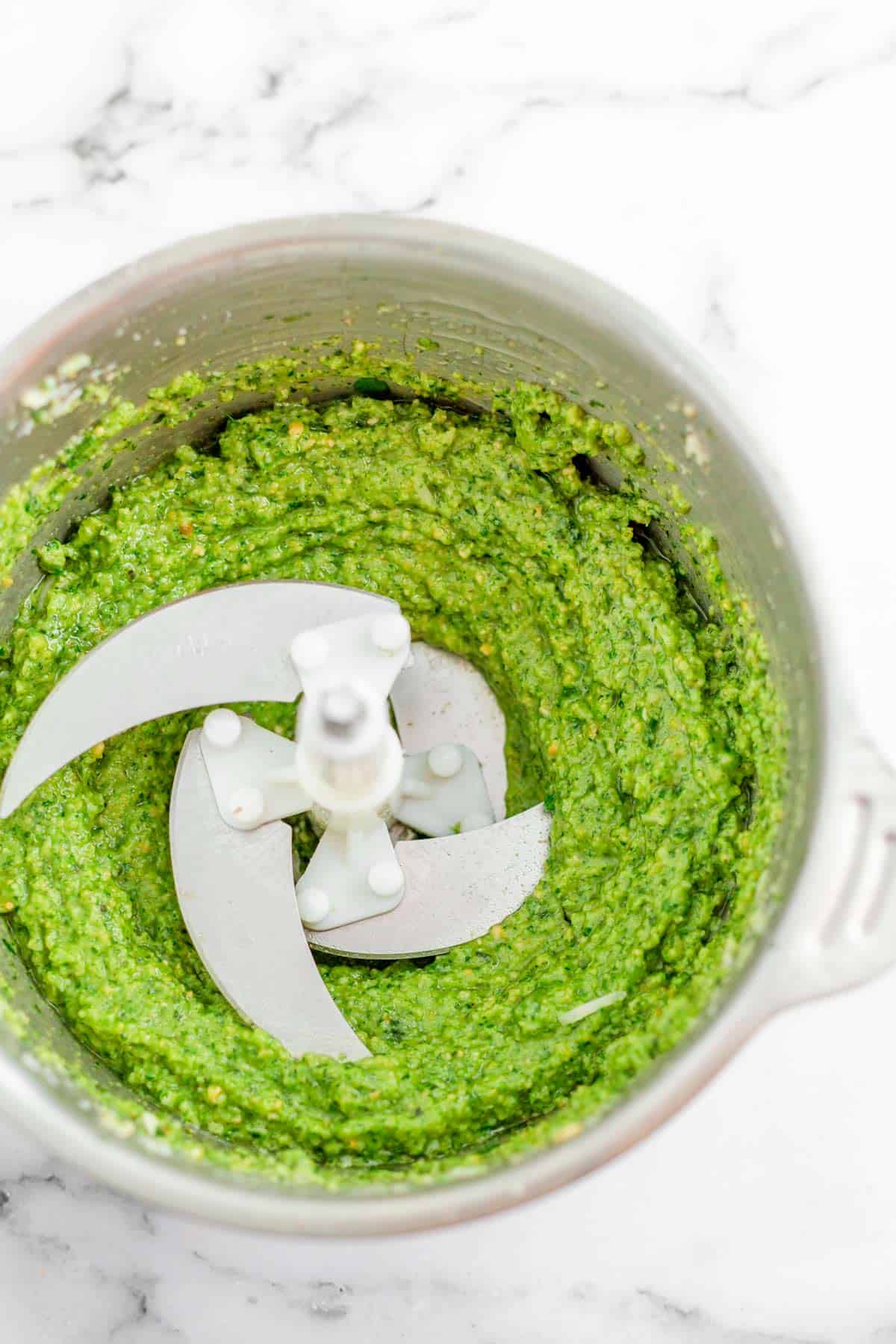 basil leaves parmesan and seasonings in food processor