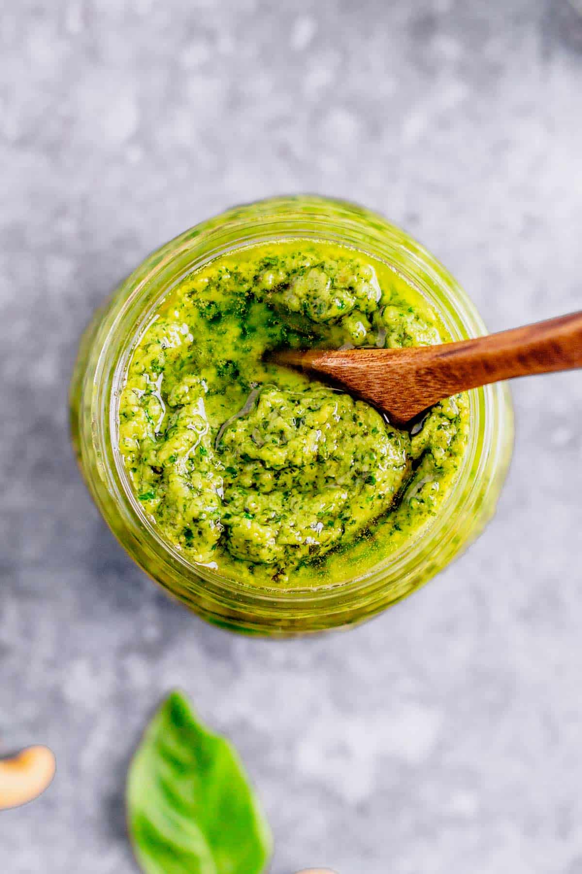 cashew basil pesto in a glass jar