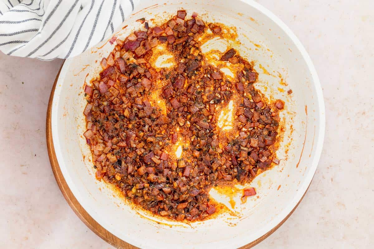 onions cooking inskillet with spices