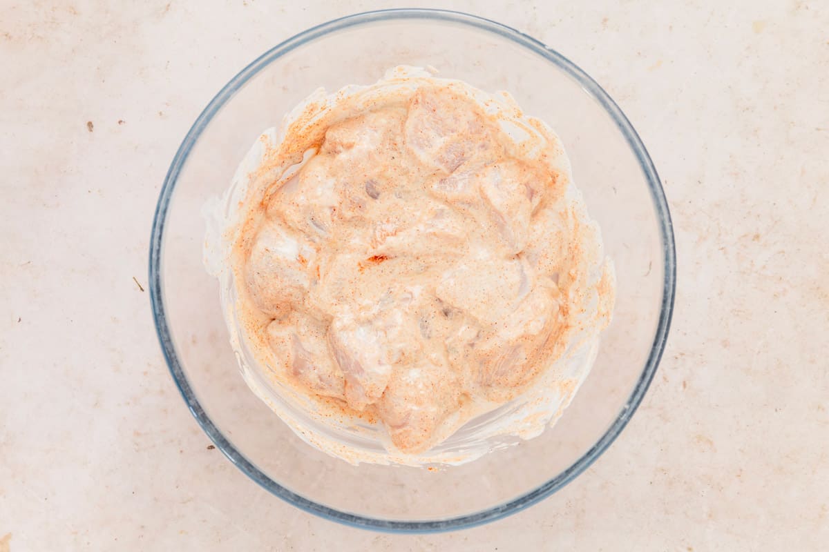 chicken marinating in yogurt and spices