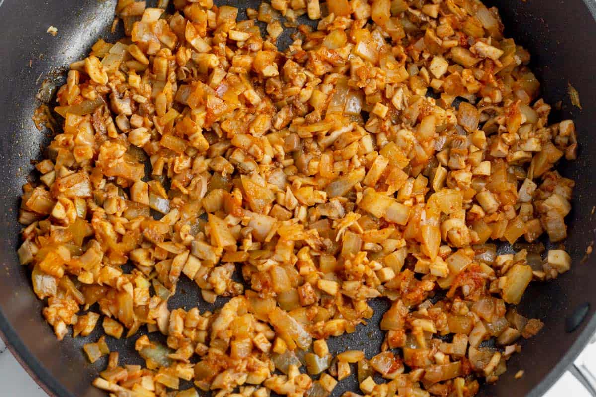 shimeji mushrooms frying in a  pan