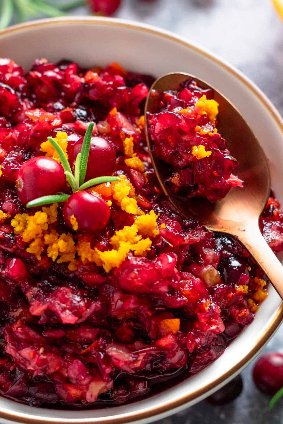 orange cranberry walnut relish in a bowl.