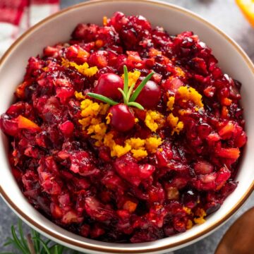 orange cranberry walnut relish in a bowl.