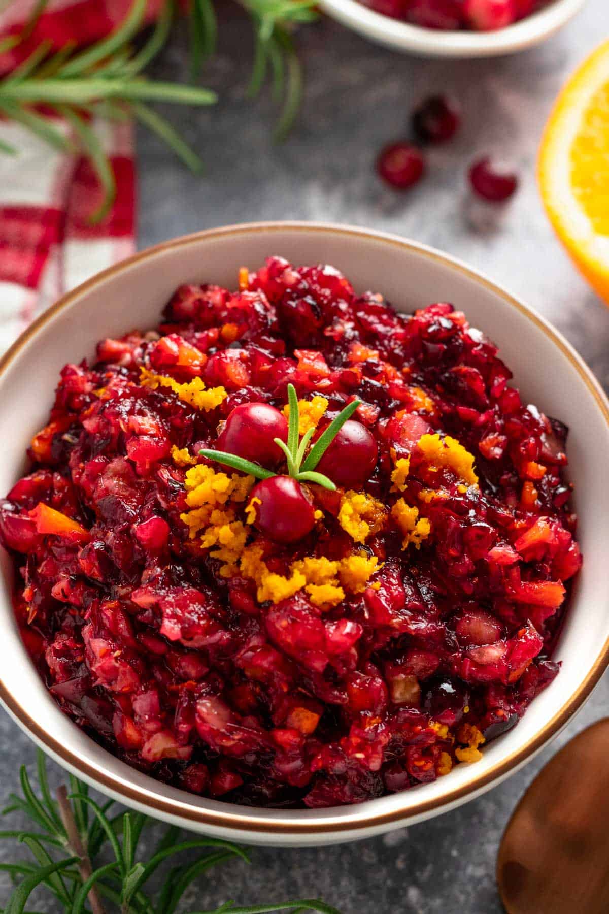 orange cranberry walnut relish in a bowl.