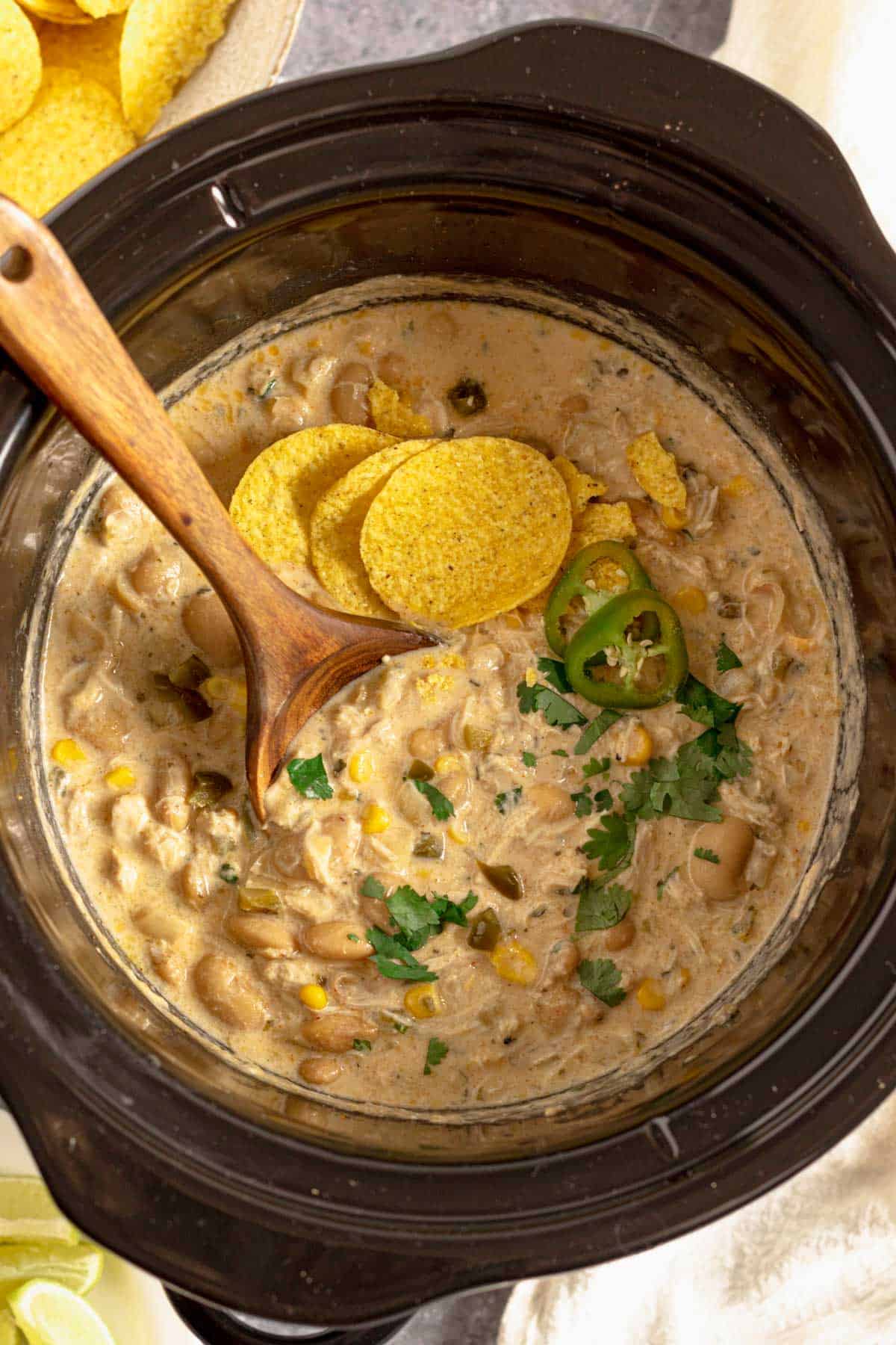 Crock Pot Chicken Chili Cream Cheese with doritos and cilantro