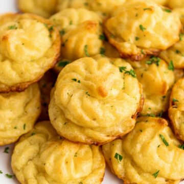 a stack of duchess potatoes on a plate