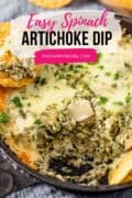 spinach artichoke dip in cast iron skillet