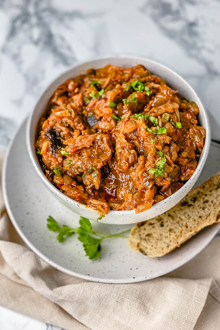 Terrific smoky eggplant caviar spread/dip! Perfect to spread over crackers for an easy, healthy, delicious appetizer. #eggplantcaviar #eggplantdip #eggplantcaviarrussian #eggplantspread #roastedeggplantspread #veganeggplantspread