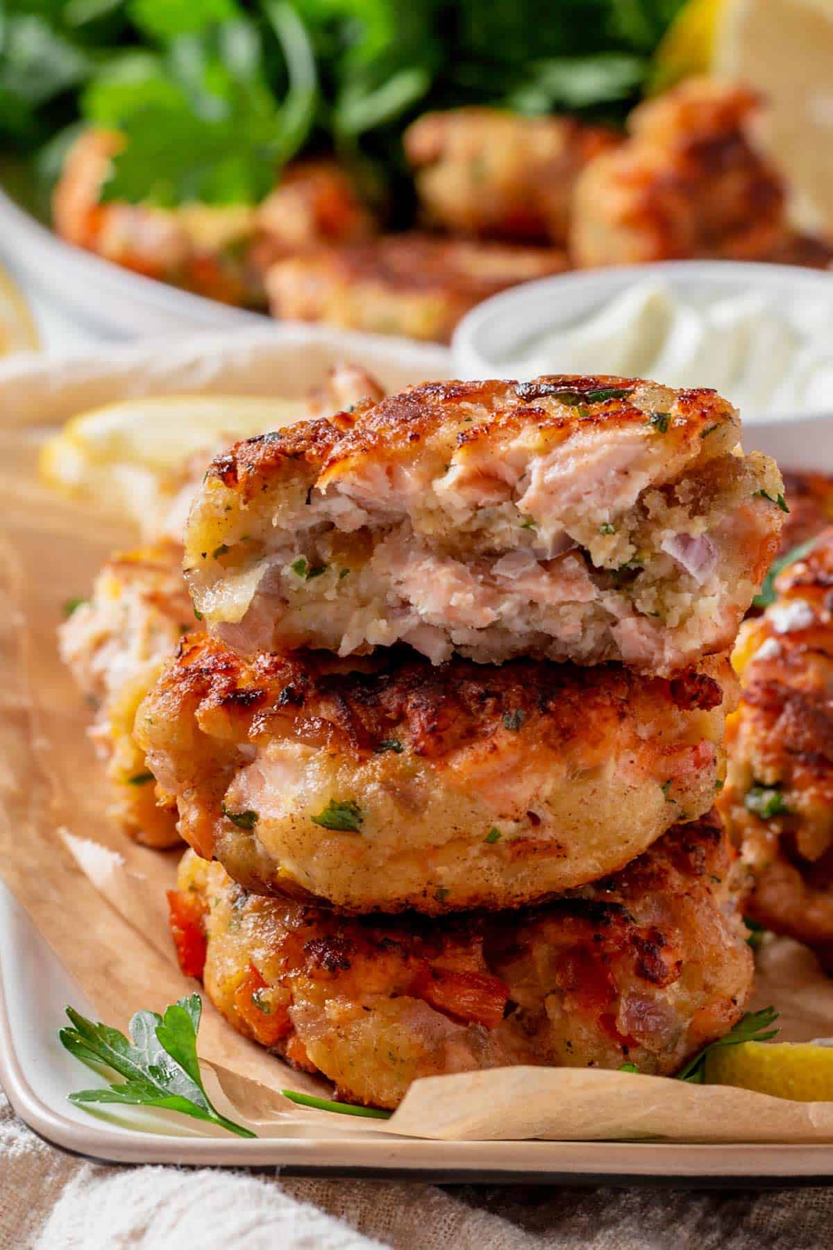 bite shot of fried salmon fish cakes