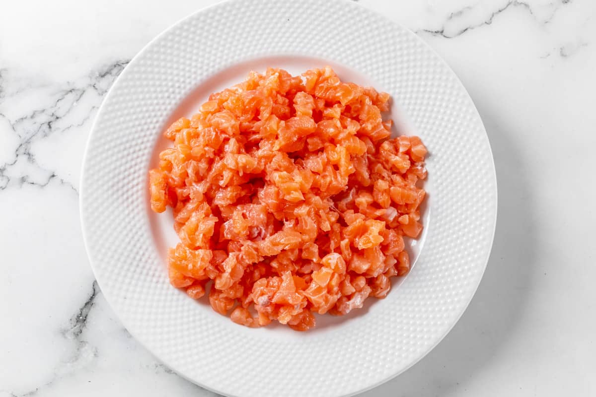 diced salmon fillet on a plate