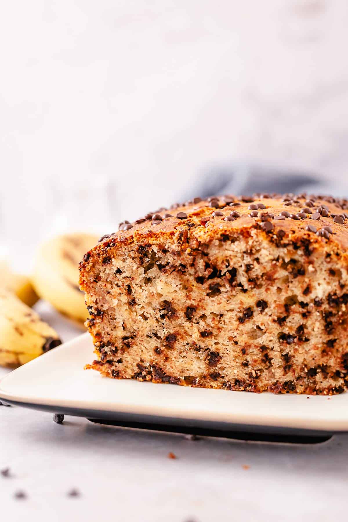 gluten free chocolate banana bread baked with one slice cut out