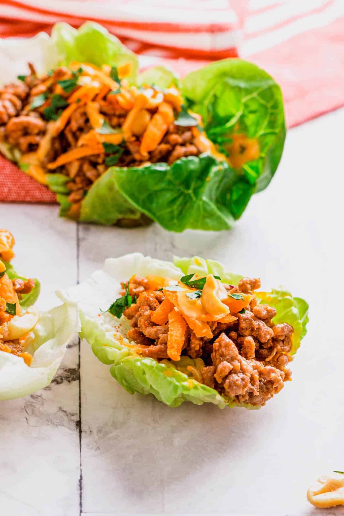 a stack of beef lettuce wraps