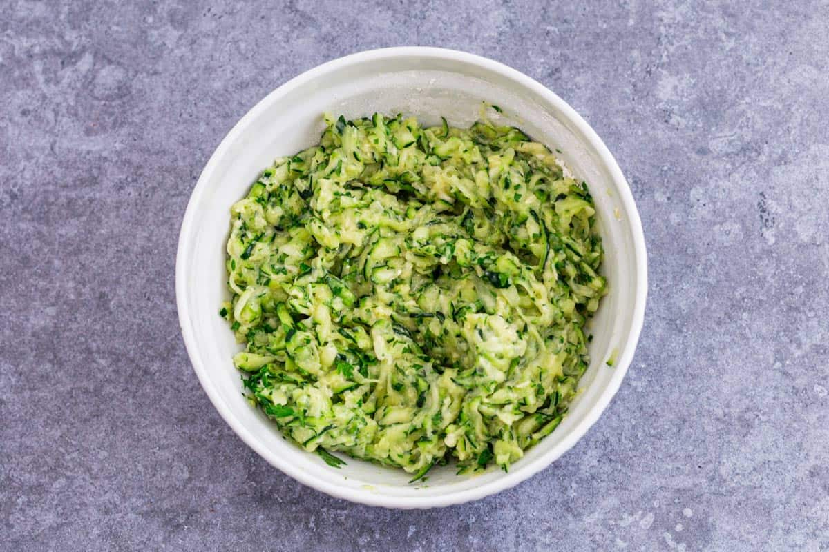 grated zucchini in a bowl