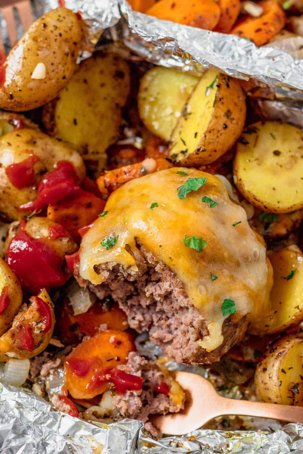 hamburger foil packets topped with cheese