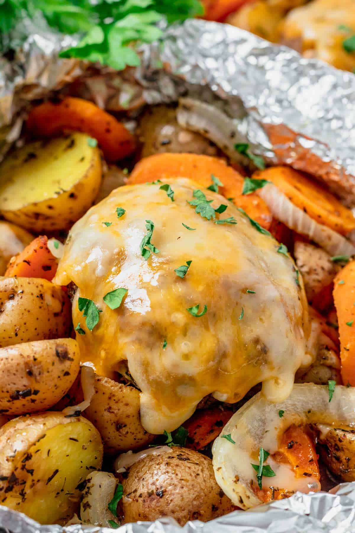 hamburger foil packets topped with cheese