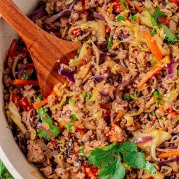 pork egg roll skillet with red sauce.