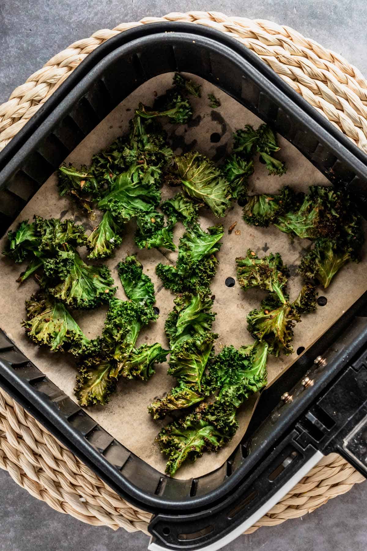 crispy kale leaves in air fryer basket