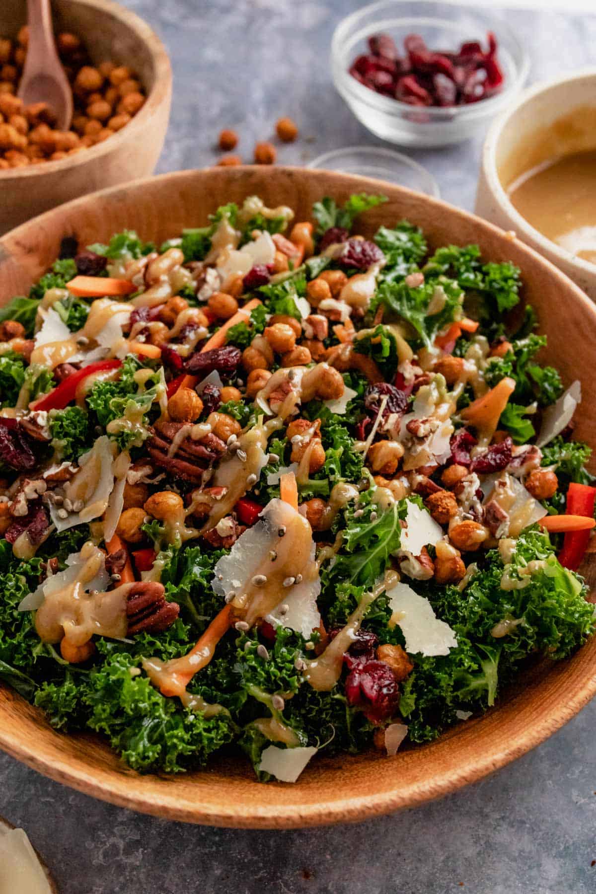 kale salad with lemon tahini dressing in a serving bowl