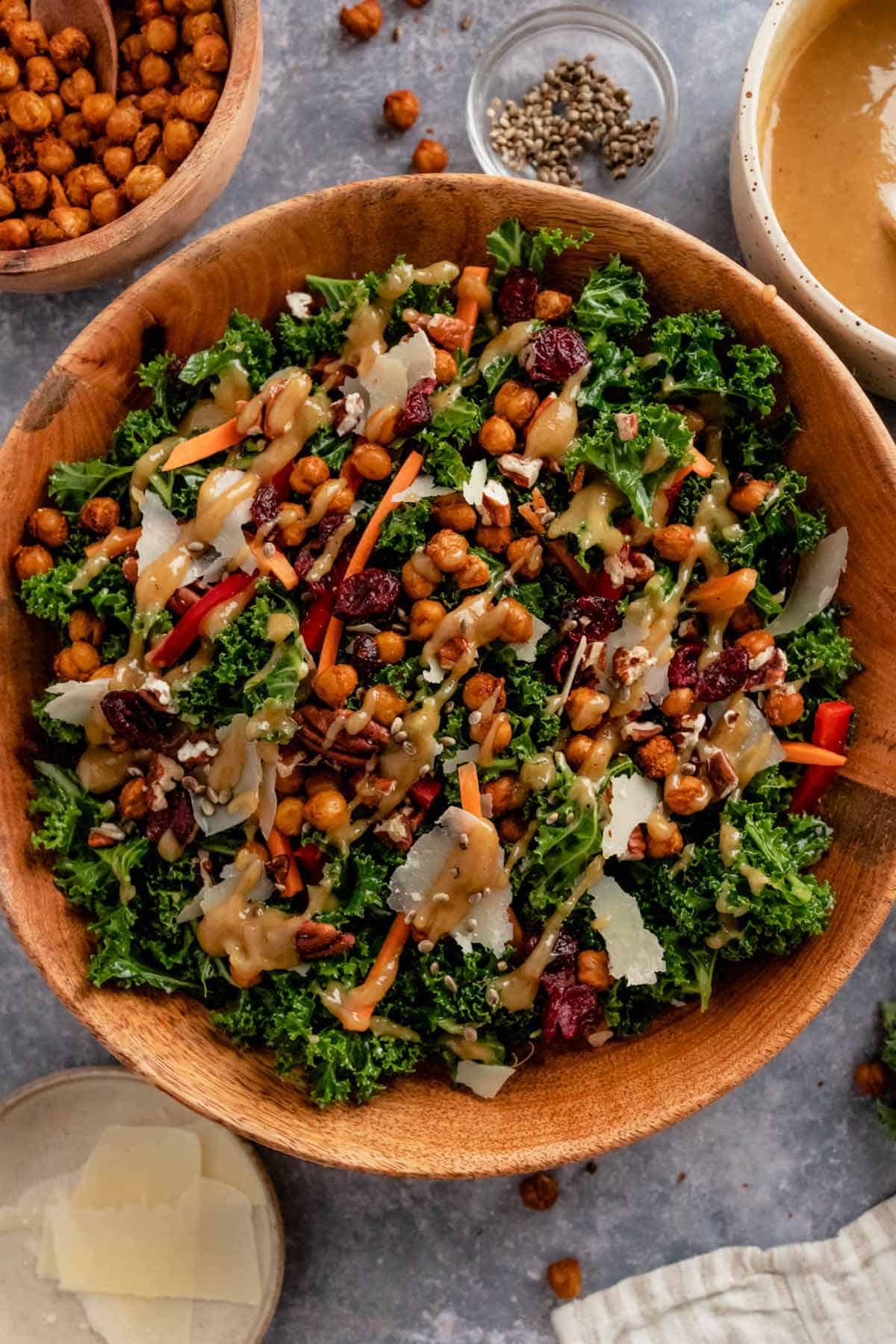 kale salad with lemon tahini dressing in a serving bowl