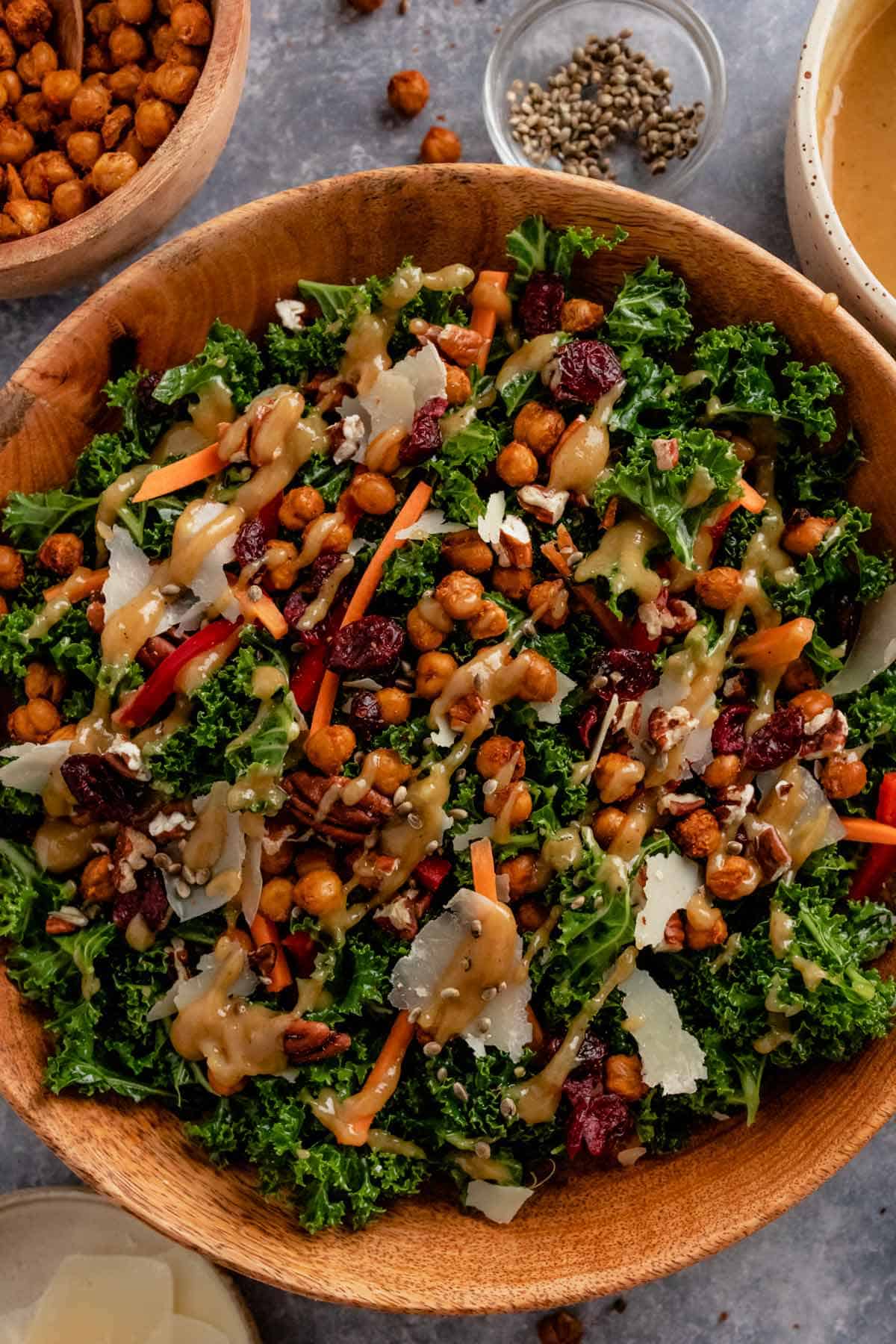 kale salad with lemon tahini dressing in a serving bowl