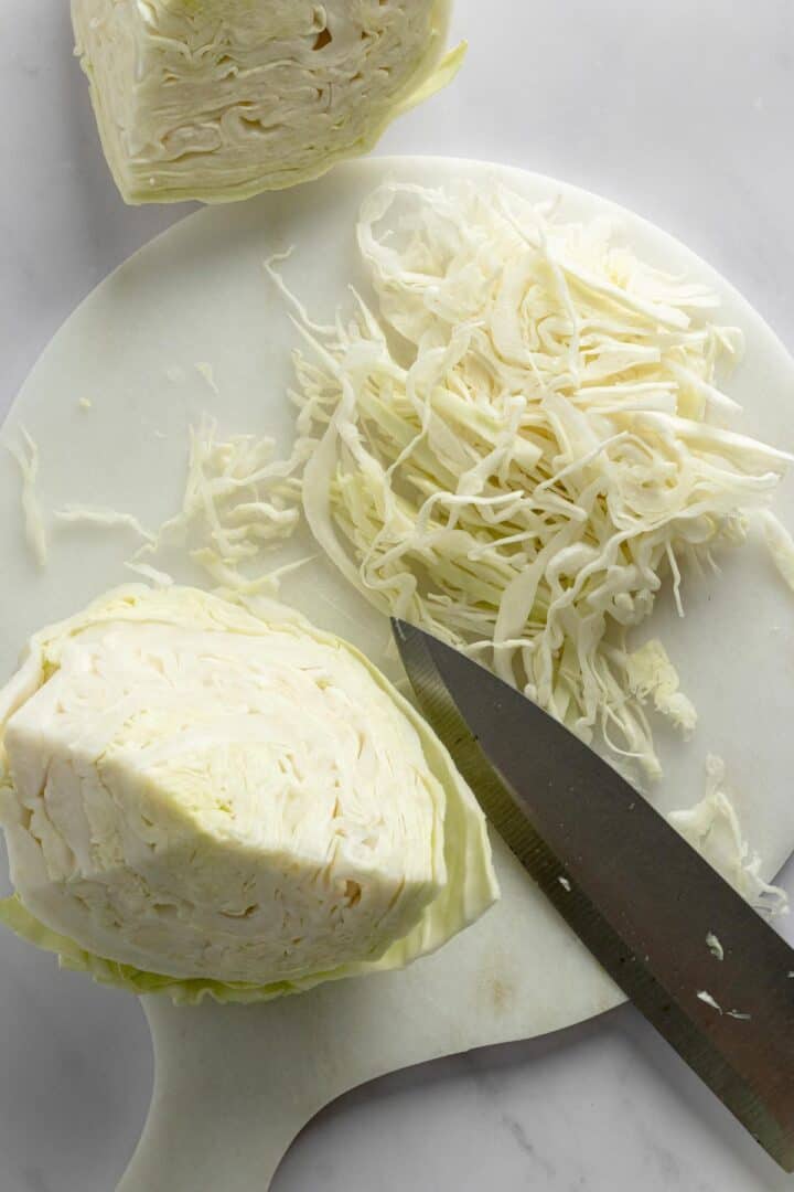 cutting sauerkraut for canning.