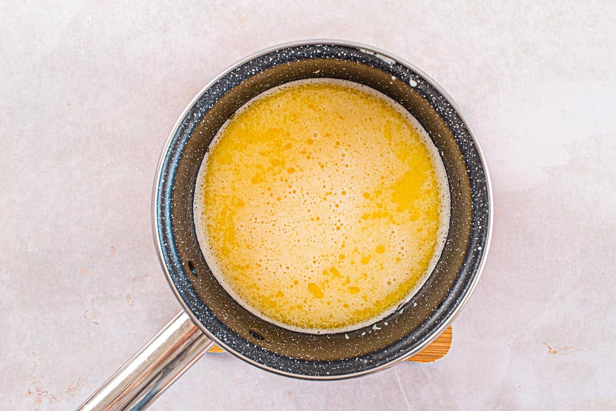 melted butter with garlic in a small saucepot