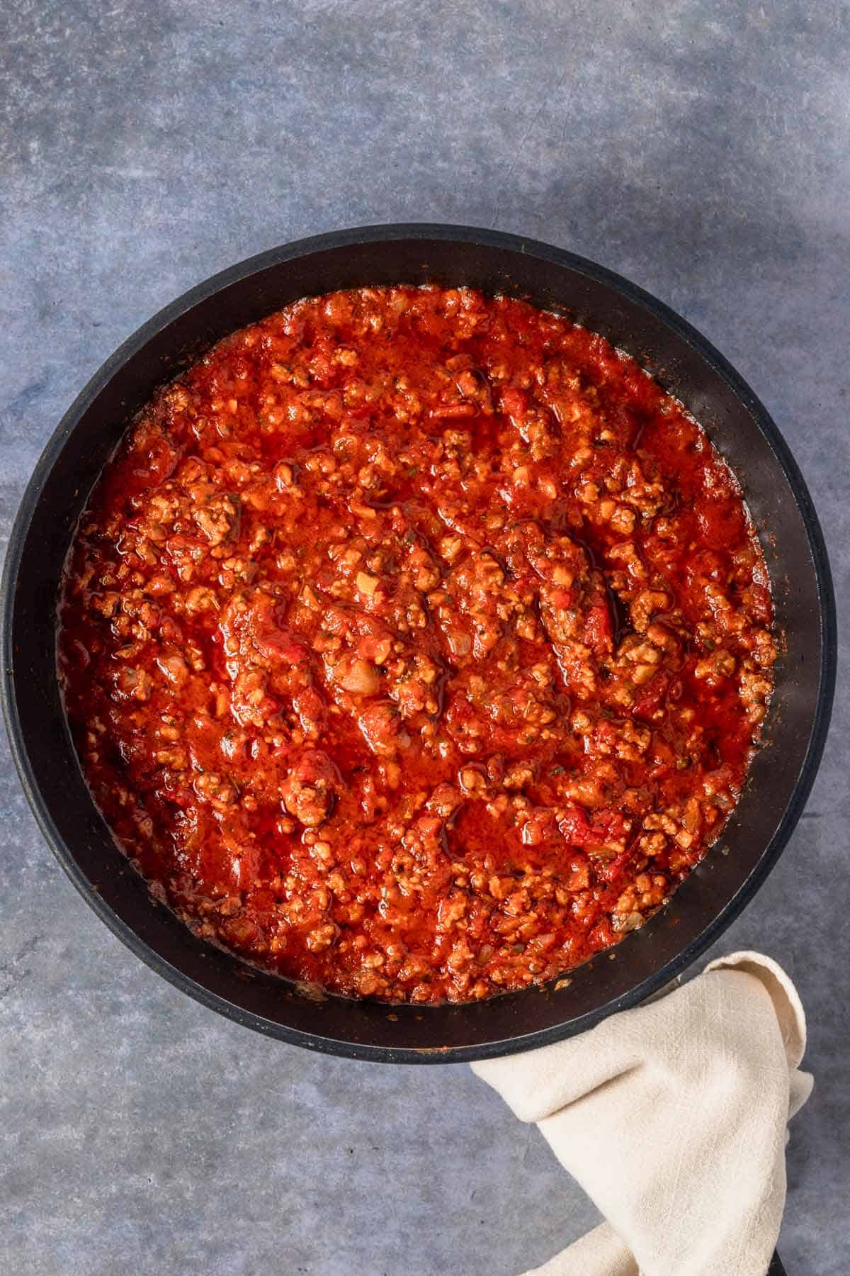 groudn meat mixed with marinara sauce