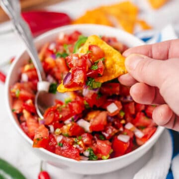 pico de gallo (mexican tomato salsa) in a bowl with tortilla chips