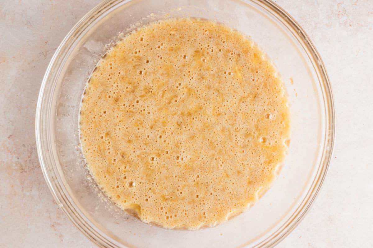 banana pineapple bread batter in a mixing bowl