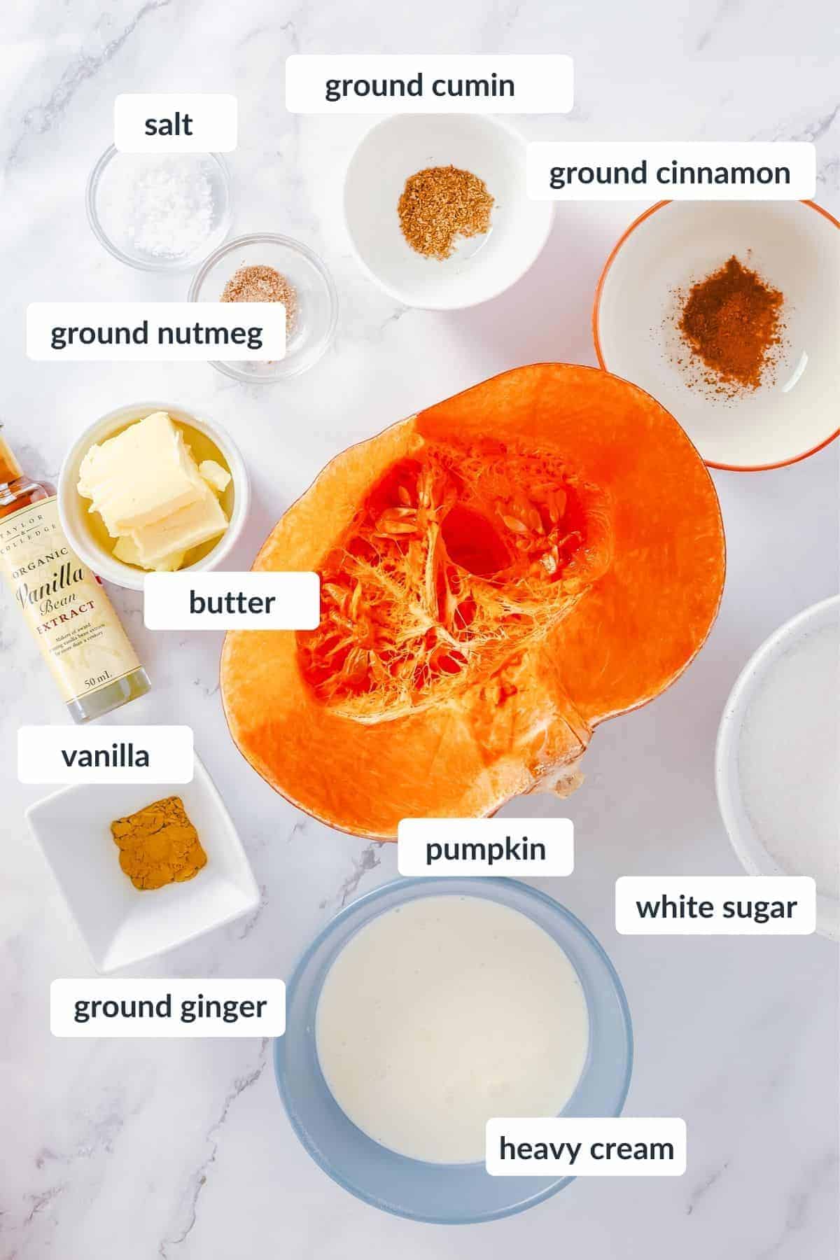 Ingredients for pumpkin caramel on a marble table