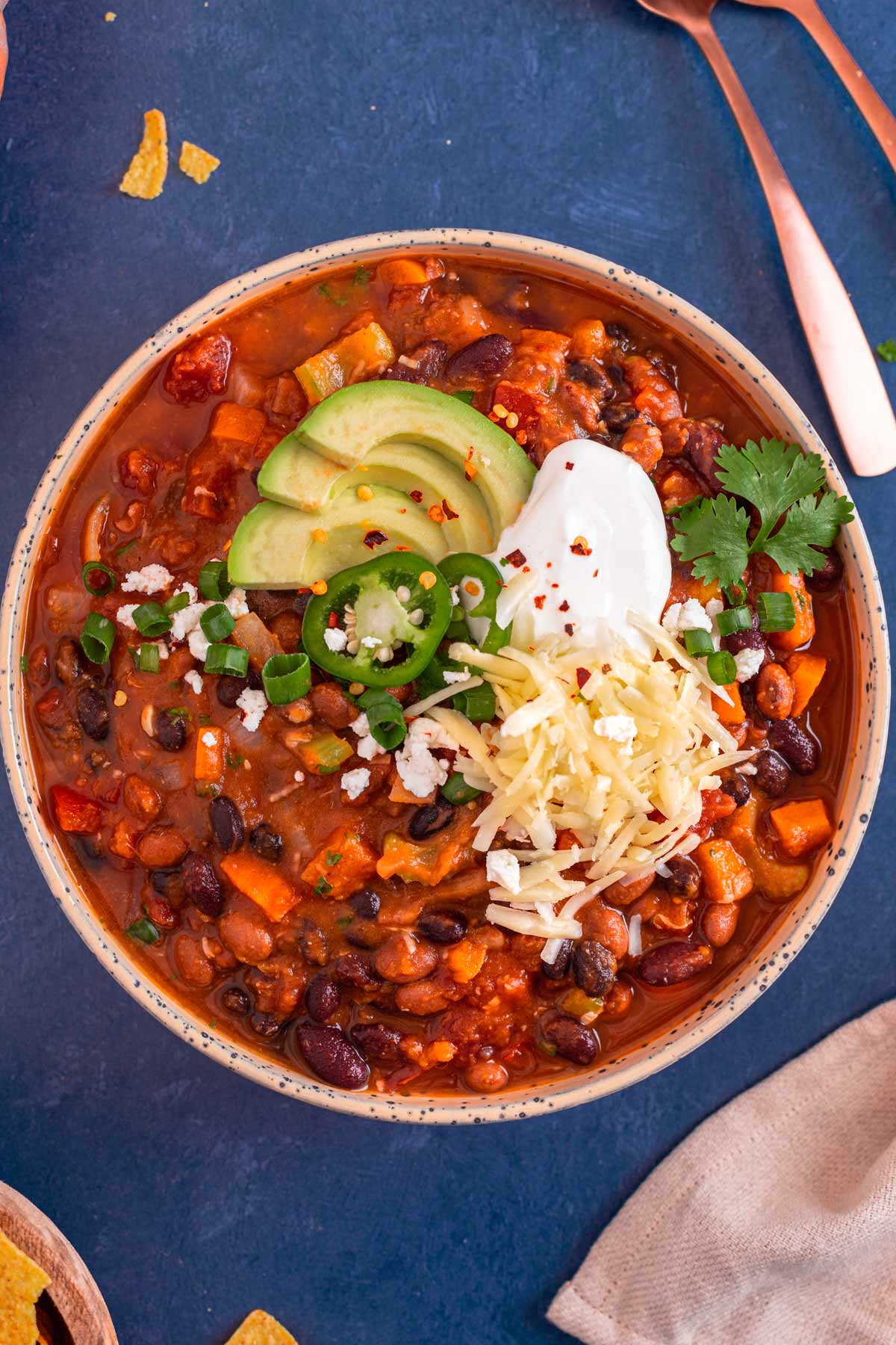 Vegan Pumpkin Chili with sour cream cheese jalapeno toppings