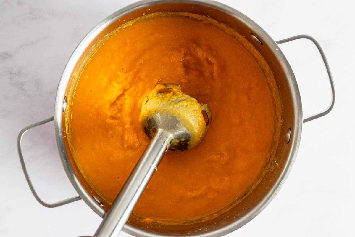 blending the pumpkin into puree.