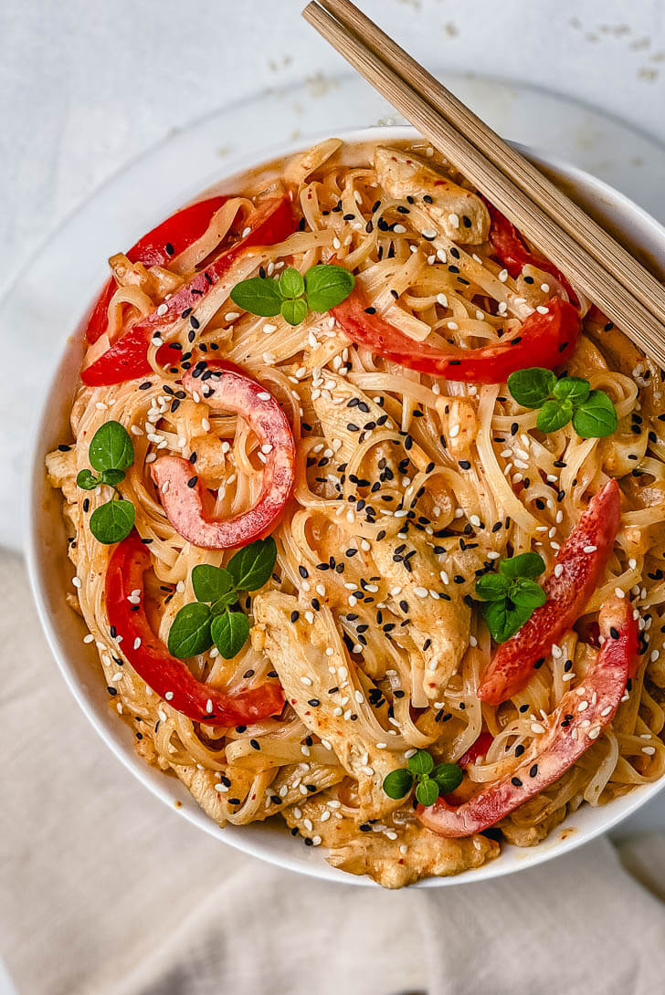 These Thai Red Curry Chicken Noodles are the perfect easy dinner recipe that will be ready in 15 minutes! This bowl of noodles is huge on flavor and is packed with bites of tender chicken, coconut milk, rice noodles, spices, and lime juice. Comforting, filling, and gluten free!