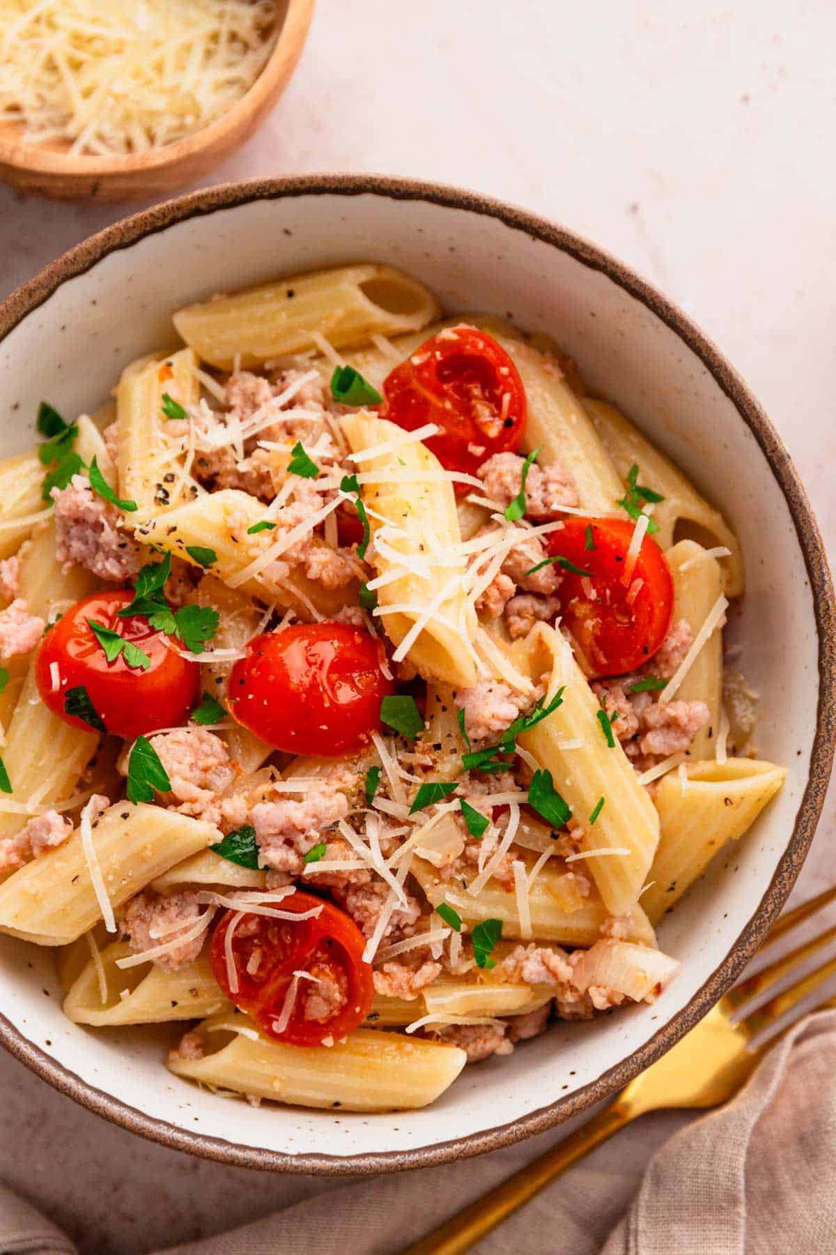 ground sausage pasta with tomatoes.