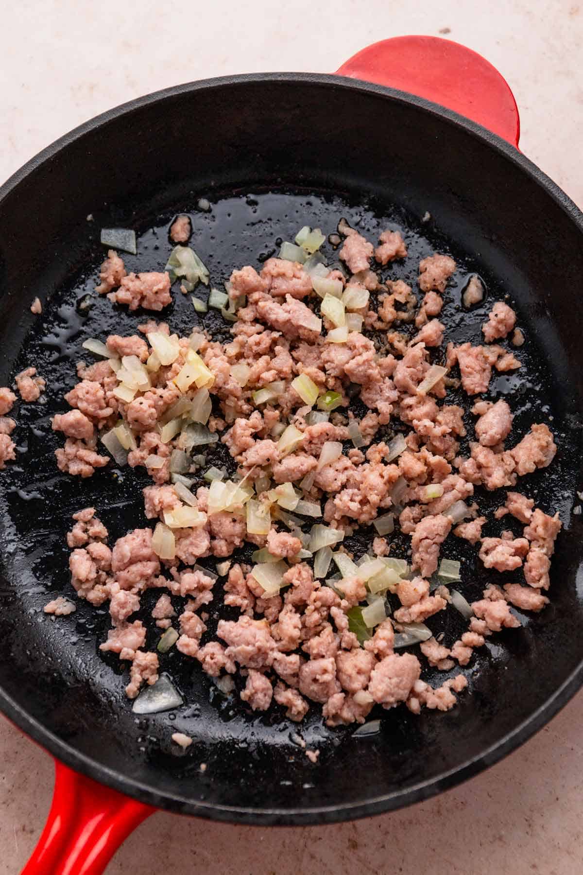 ground sausage in skillet.